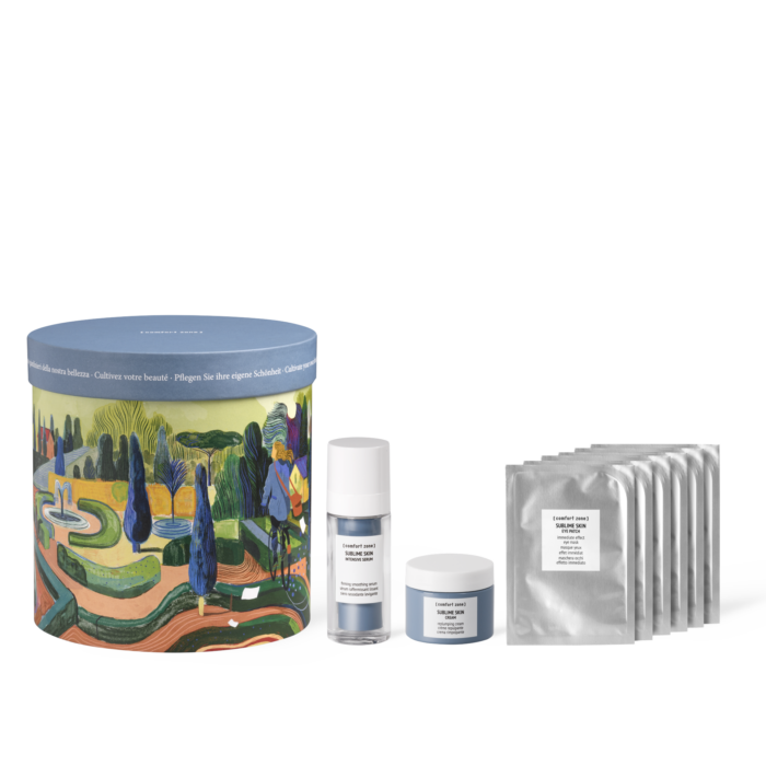 Designer Geschenkbox. Nebenstehend das Sublime Skin Intensive Serum im Pumpspender, die Sublime Skin Cream im Tiegel und sechs Stück der Sublime Skin Eye Patches